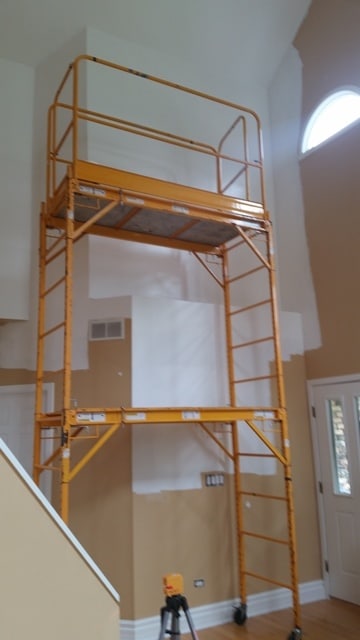 scaffolding set up for the wallpaper installation - elgin, il