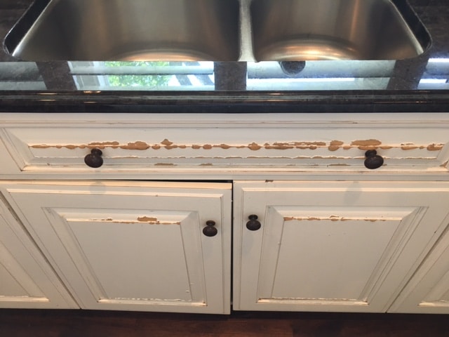 water damaged cabinet - top 3 problems with painted cabinets