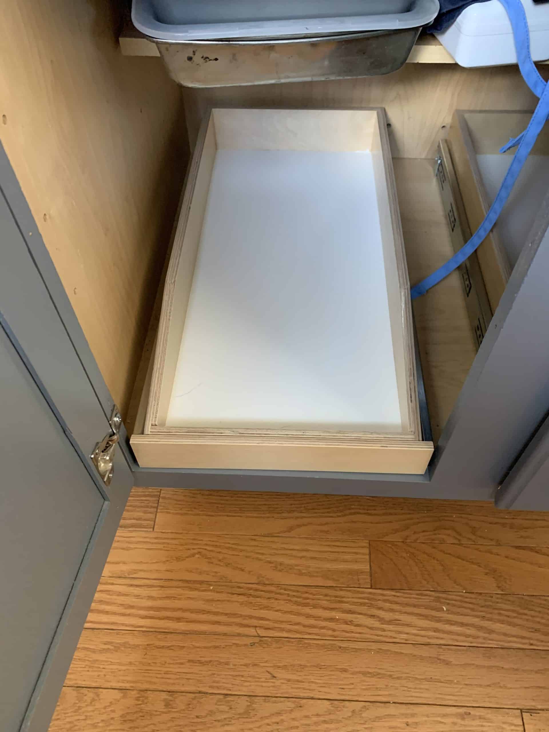 installing sliding shelf in kitchen cabinets