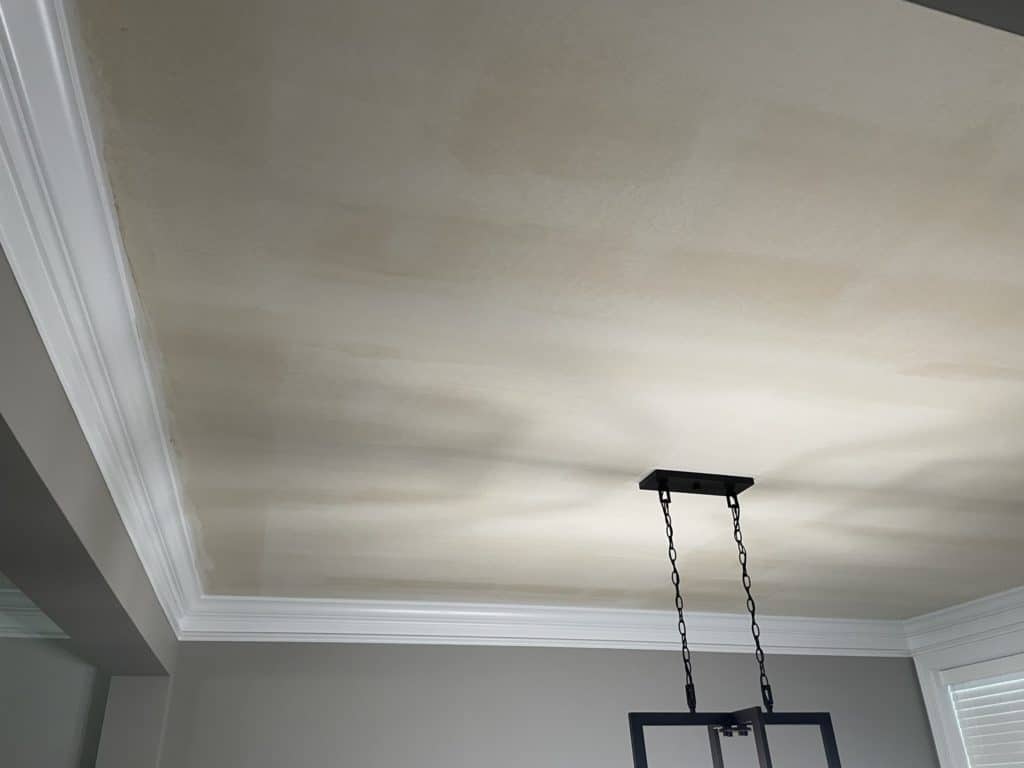 applying wallpaper glue - wallpaper ceiling