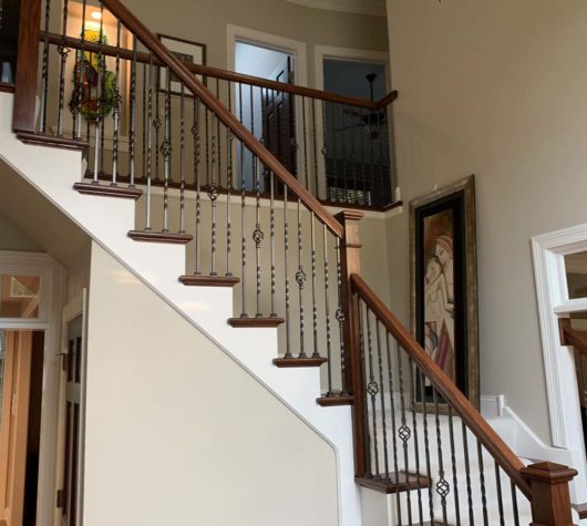 Brown and white painted staircase