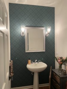 accent wallpaper in powder room