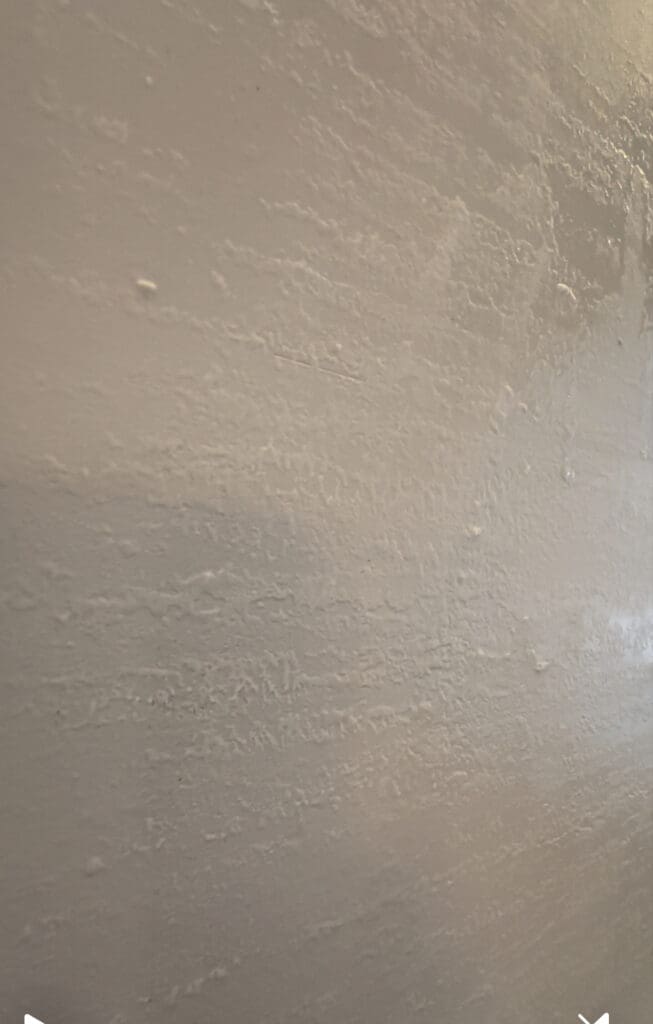 removing wallpaper adhesive from walls