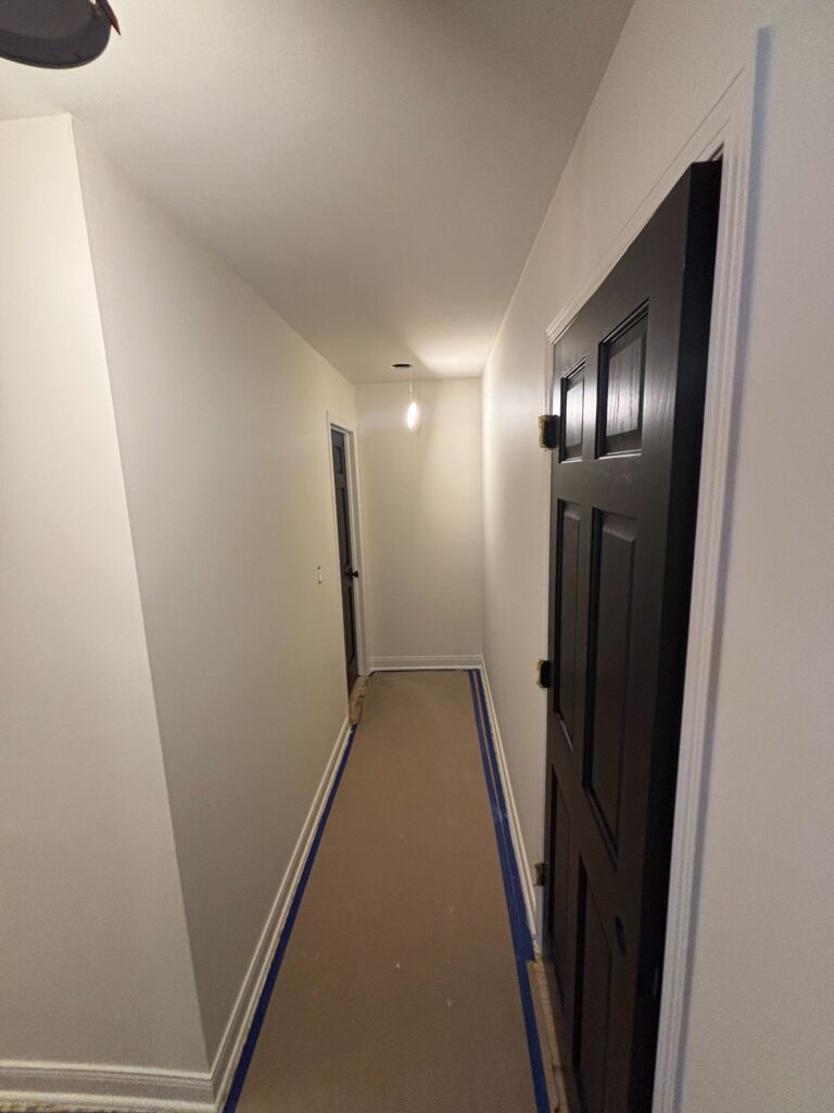 white walls black painted doors