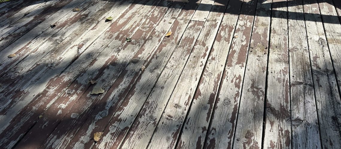 old wood deck getting restained